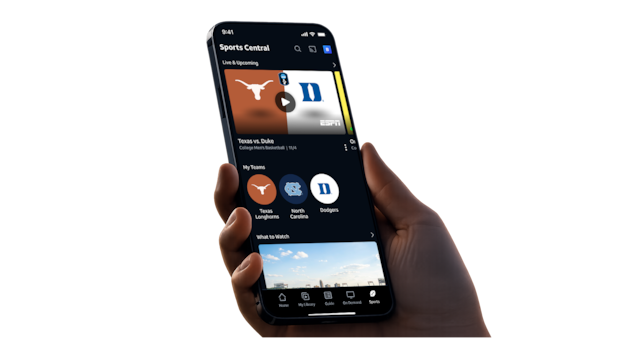 A hand holding a mobile with a personalized content on screen.